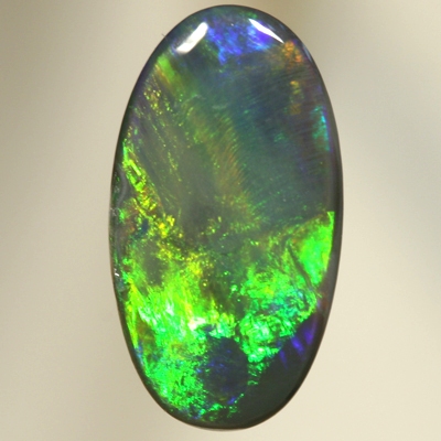 SOLID BLACK OPAL Golden gem fire, oranges and greens with a touch of blue. SEE VIDEO